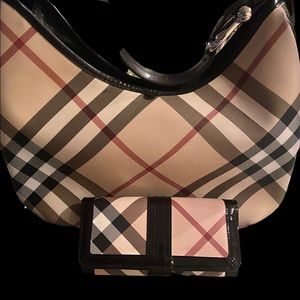 Burberry Hobo bag and wallet Hobo bag measures 15” L  and Height 9.0 and 2.25 W